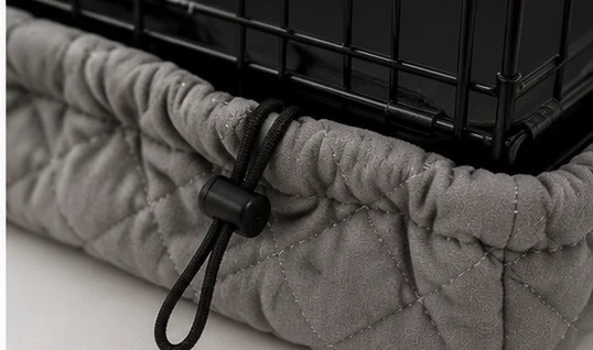 Crate Wrap drawcord toggle